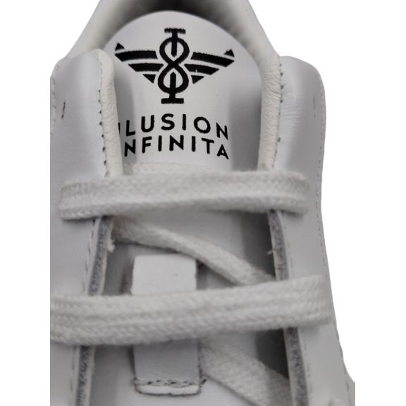 Zapatillas Ilusion Infinita piel blanco logo azul C11881